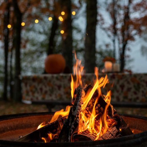 Glowing campfire in autumn